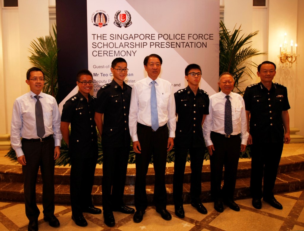 L - R: Permanent Secretary, Ministry of Home Affairs, Mr Leo Yip, INSP Darrel Long, INSP Tan Kuan Hian, Deputy Prime Minister, Mr Teo Chee Hean, INSP Ryan Lai, Chairman, Public Service Commission, Mr Eddie Teo and Commissioner of Police Mr Hoong Wee Teck